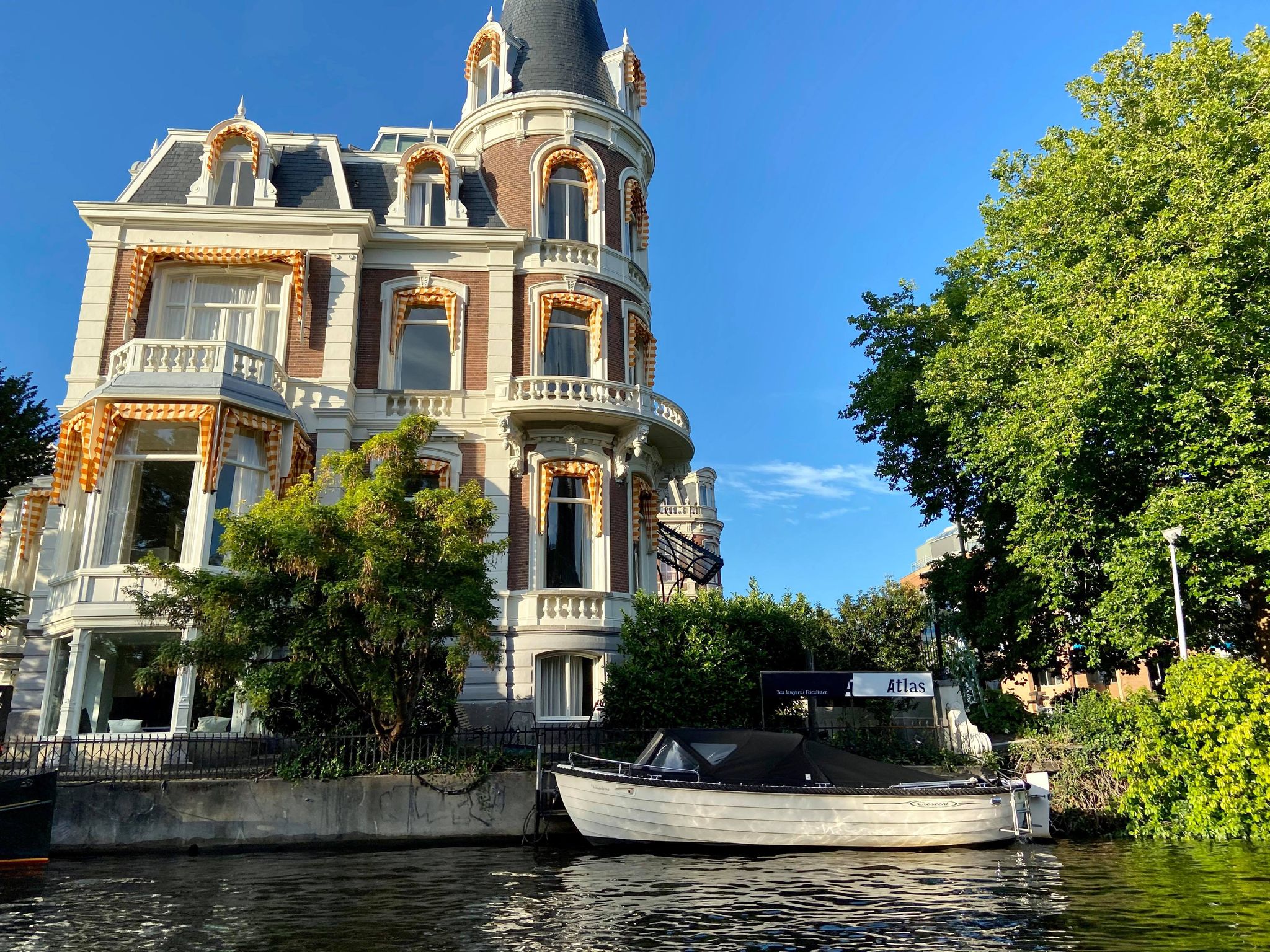 yellow house on a dutch canal